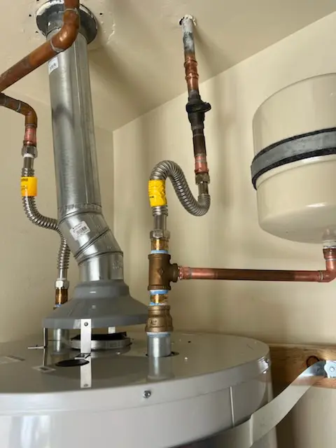 Water heater installation and plumbing repair in Devonshire